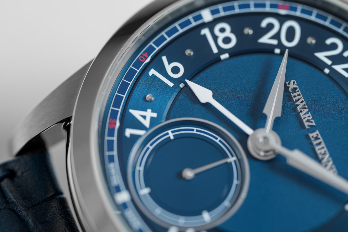 Schwarz Etienne 1902 GMT, blue dial detail showing the raised 24-hour ring and small seconds