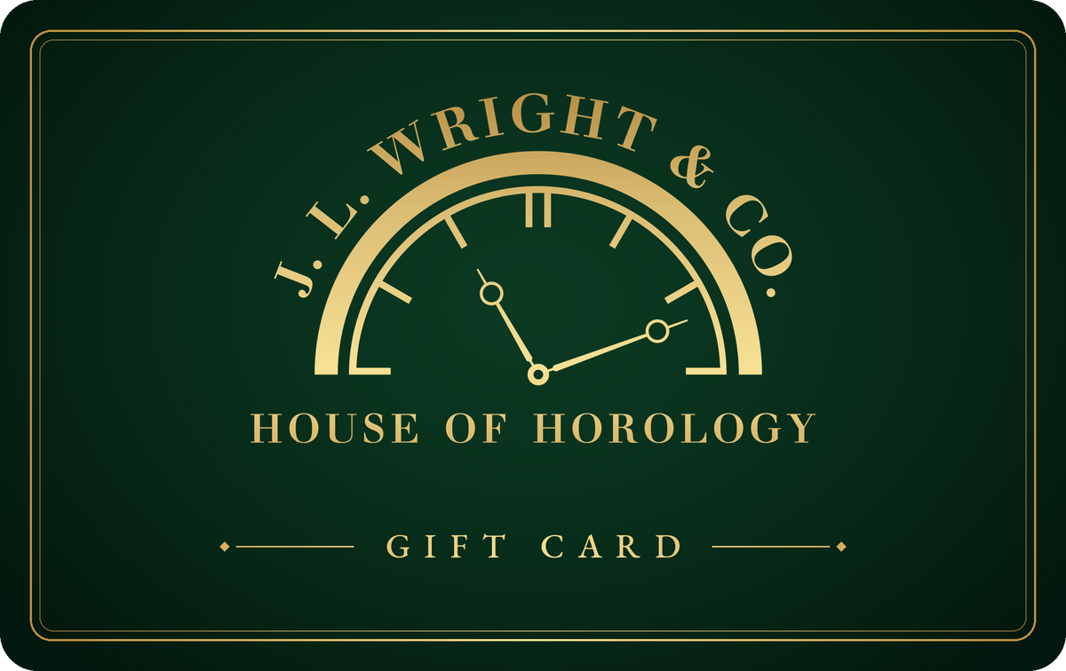 J.L. Wright & Co. gift card in brand green with the gold House of Horology mark