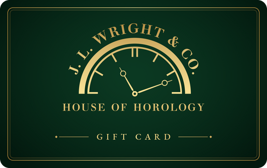 J.L. Wright & Co. gift card in brand green with the gold House of Horology mark