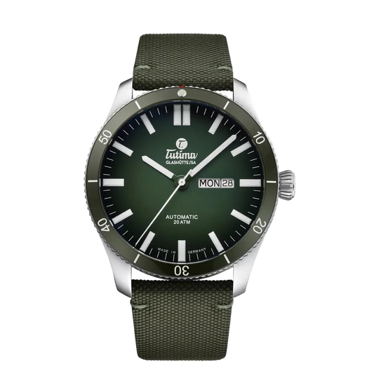 Tutima Grand Flieger Airport Automatic, reference 6107-03, green dégradé dial and green ceramic bezel on a green Cordura strap